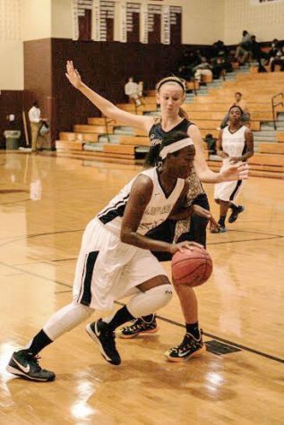 Senior Maya Bull dribbles past the Cuthbertson Cavaliers