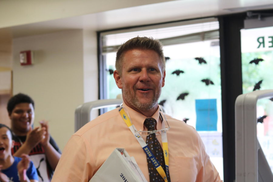 Principal Rick Parker in shock after receiving the Principal of the Year award. 