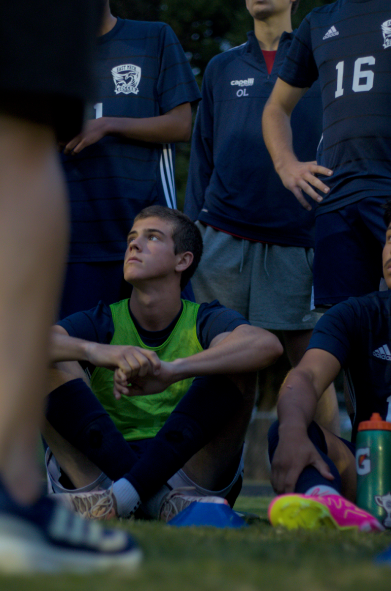 Ethan Fallowes looks at teammates during halftime. 