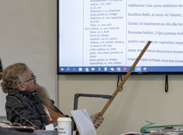 Latin teacher Deric Oates teaches his IB Latin class. Oates teaches all six levels of Latin offered, including IB SL and HL.